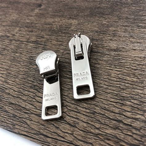 images of real prada pants zipper pulls